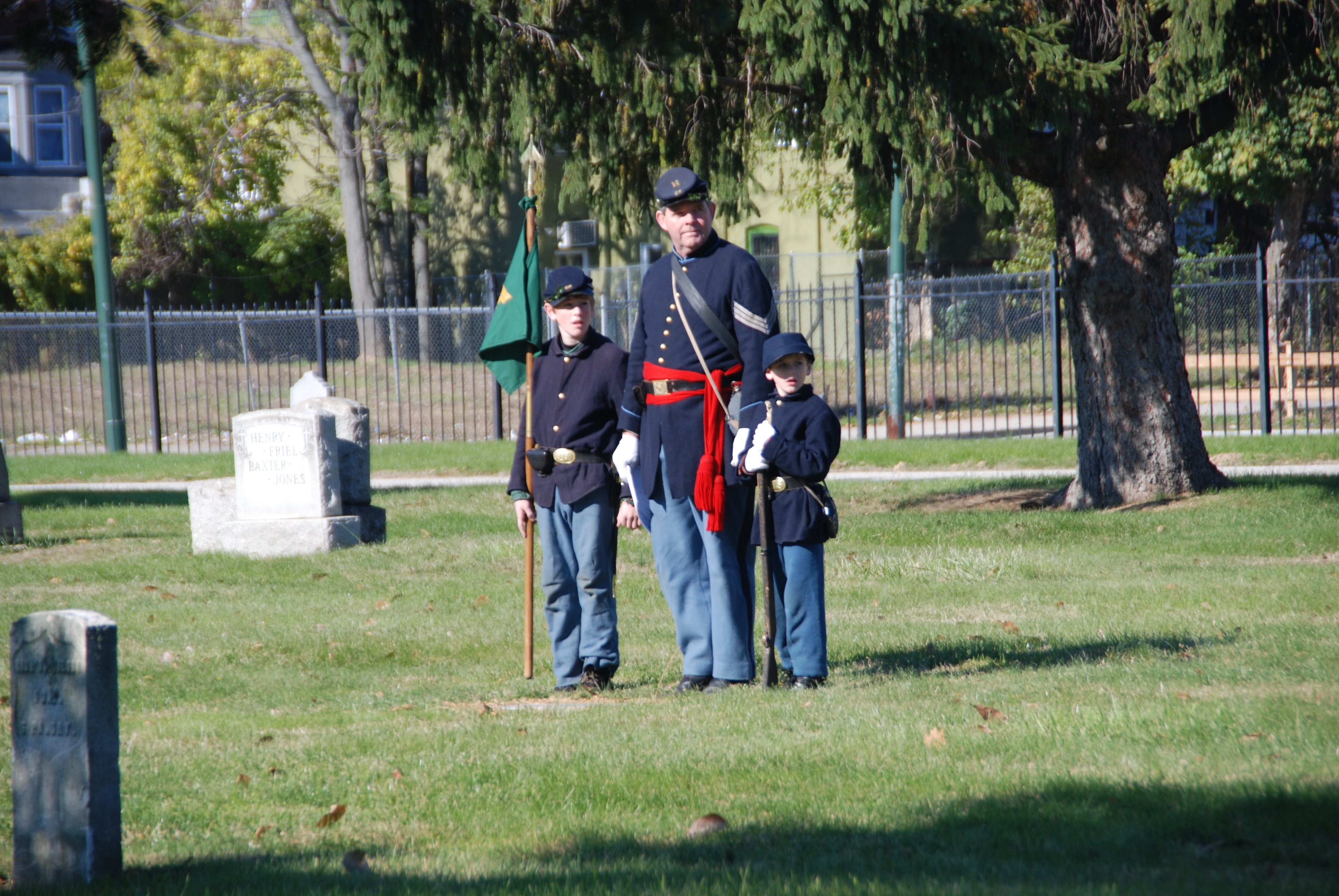 Here his two young assistants help with the location